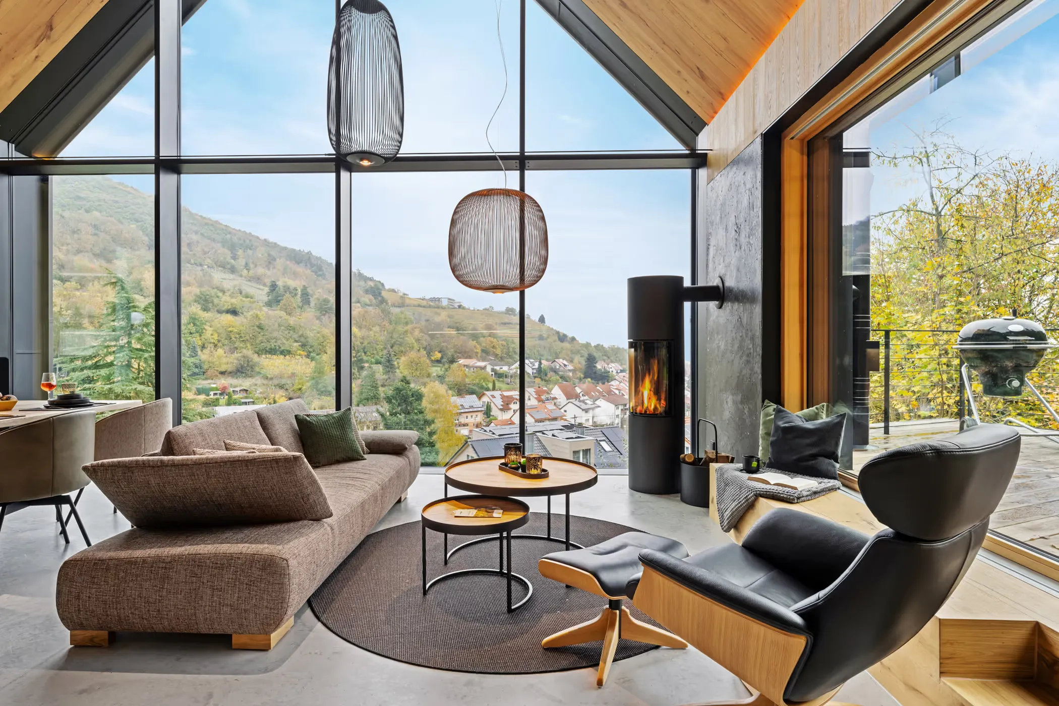 Holiday-home photographer — living room with a lit fireplace