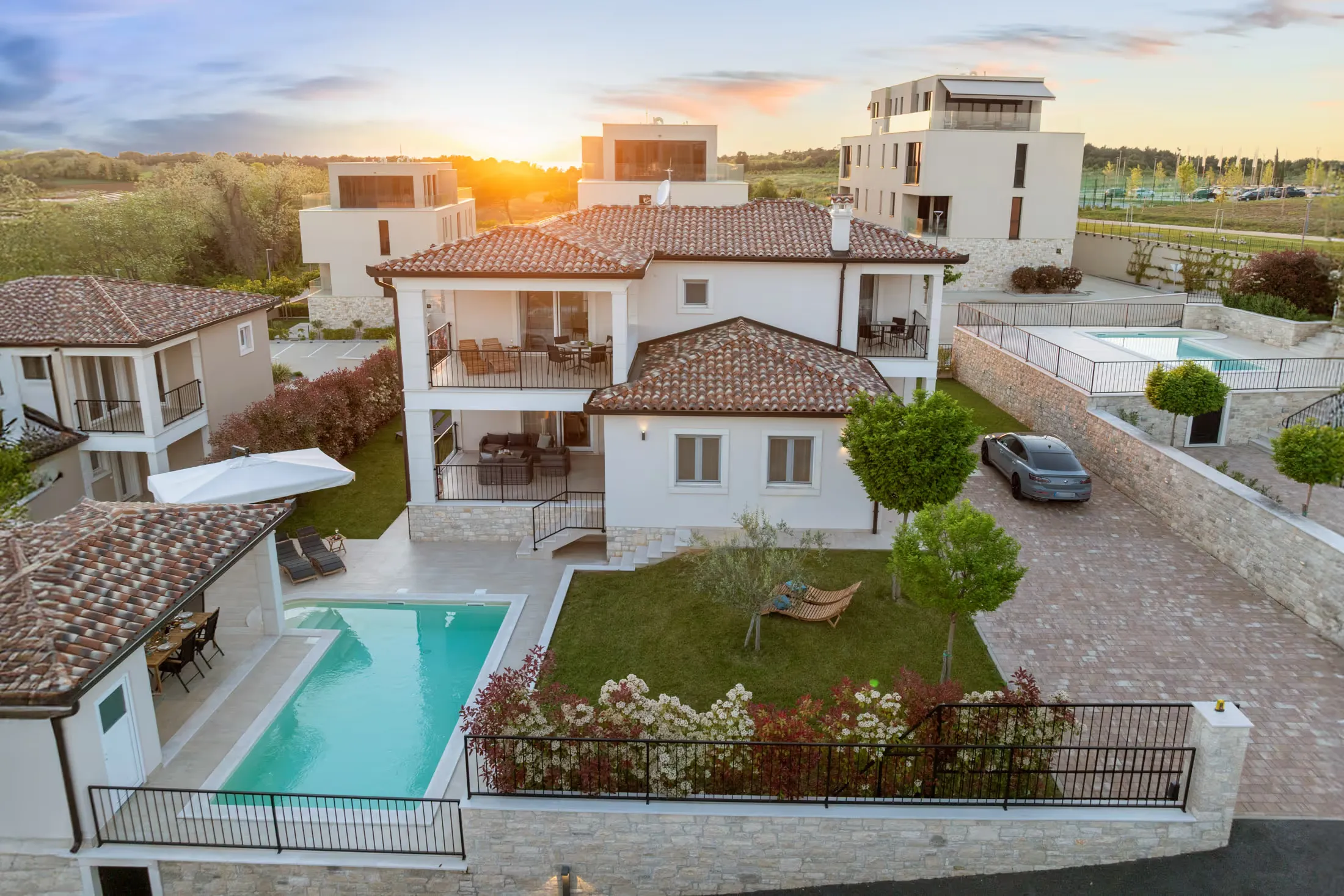 Exterior view of a holiday villa with pool