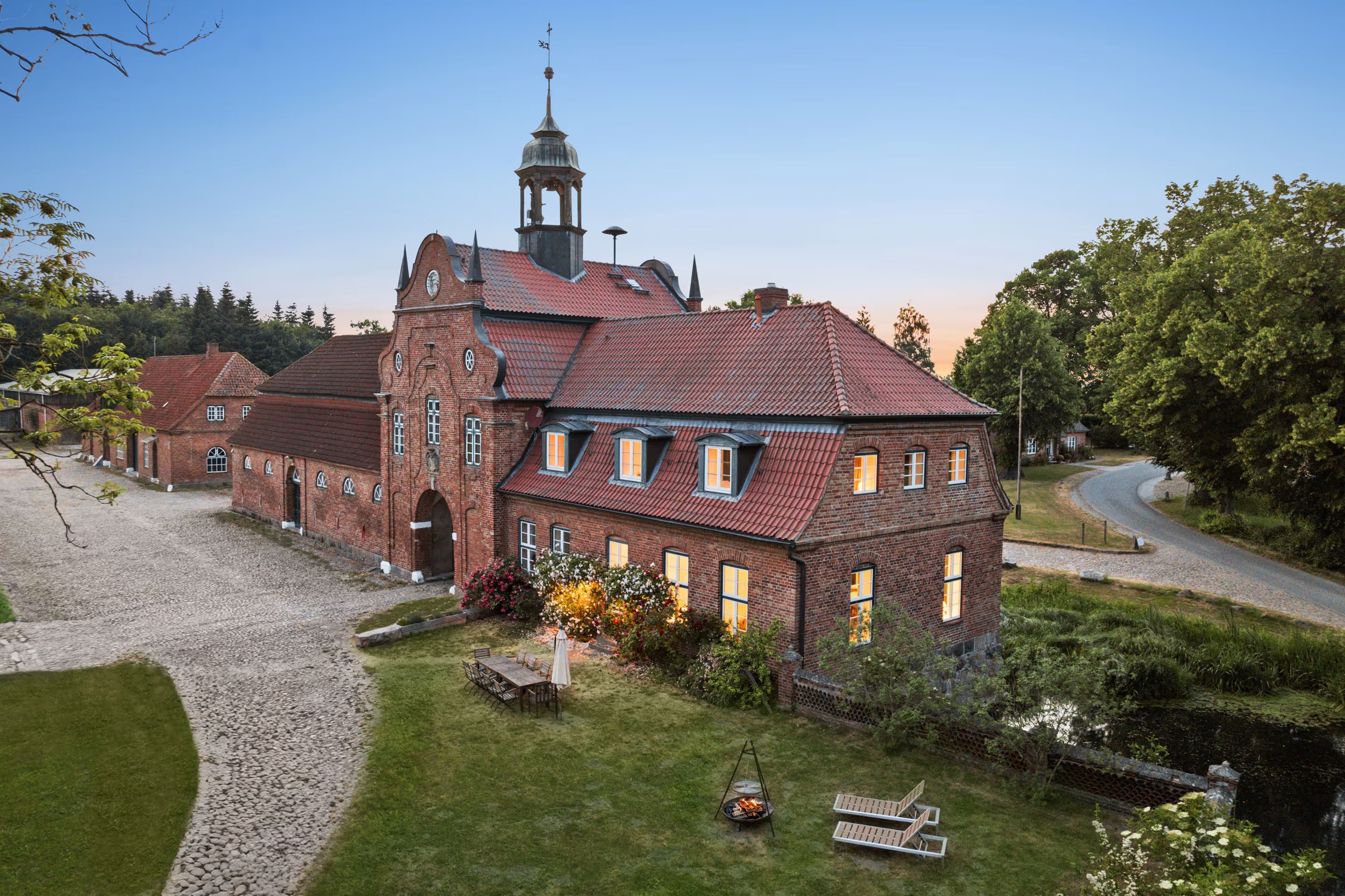 Aerial view of the gatehouse with its tower at dusk