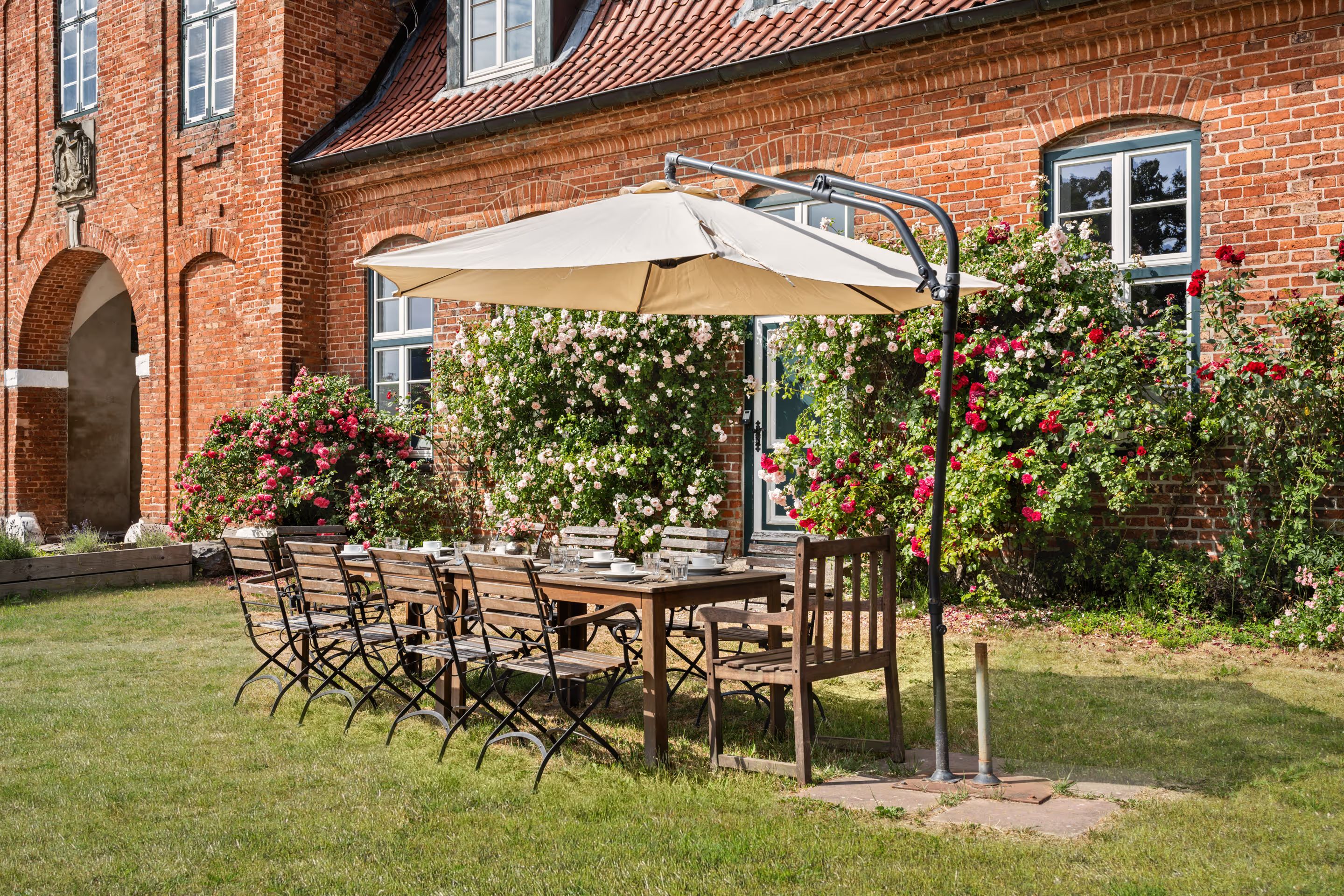 Table set in the garden in front of the gatehouse