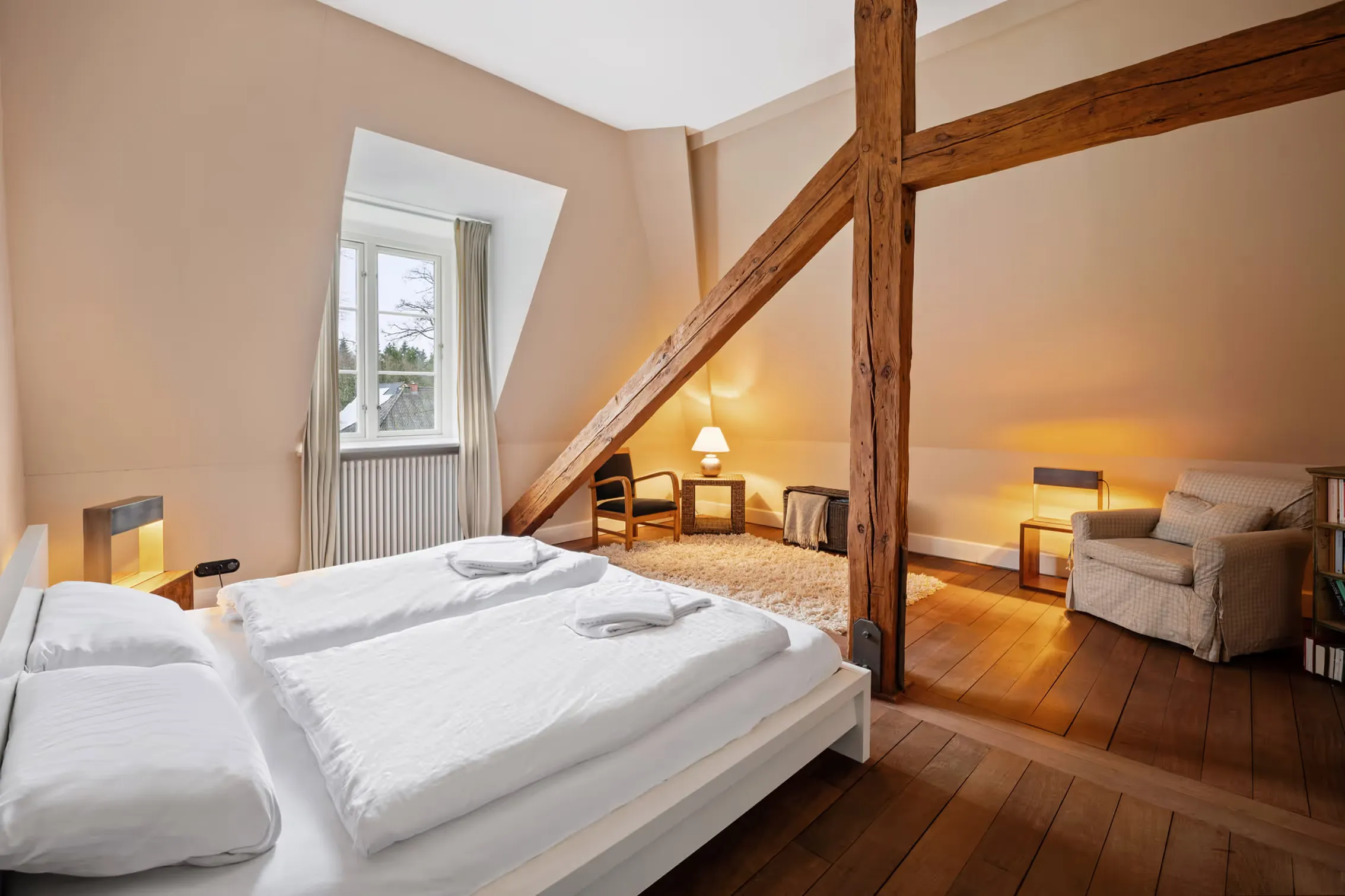 Real estate photography of holiday homes, daytime shot of a bedroom at Gut Kletkamp