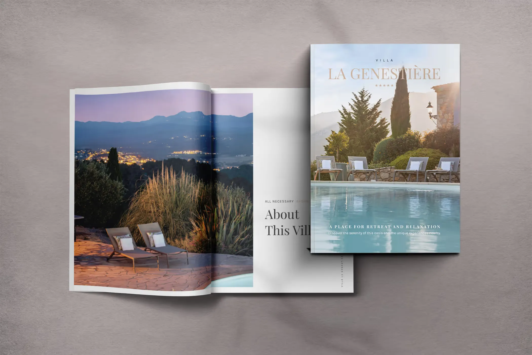 Guest magazine open, showing a view of the town at dusk