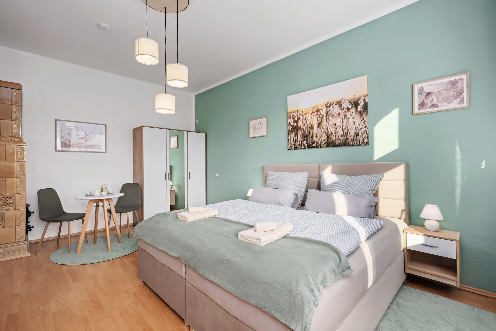 Bedroom with seating nook and wardrobe