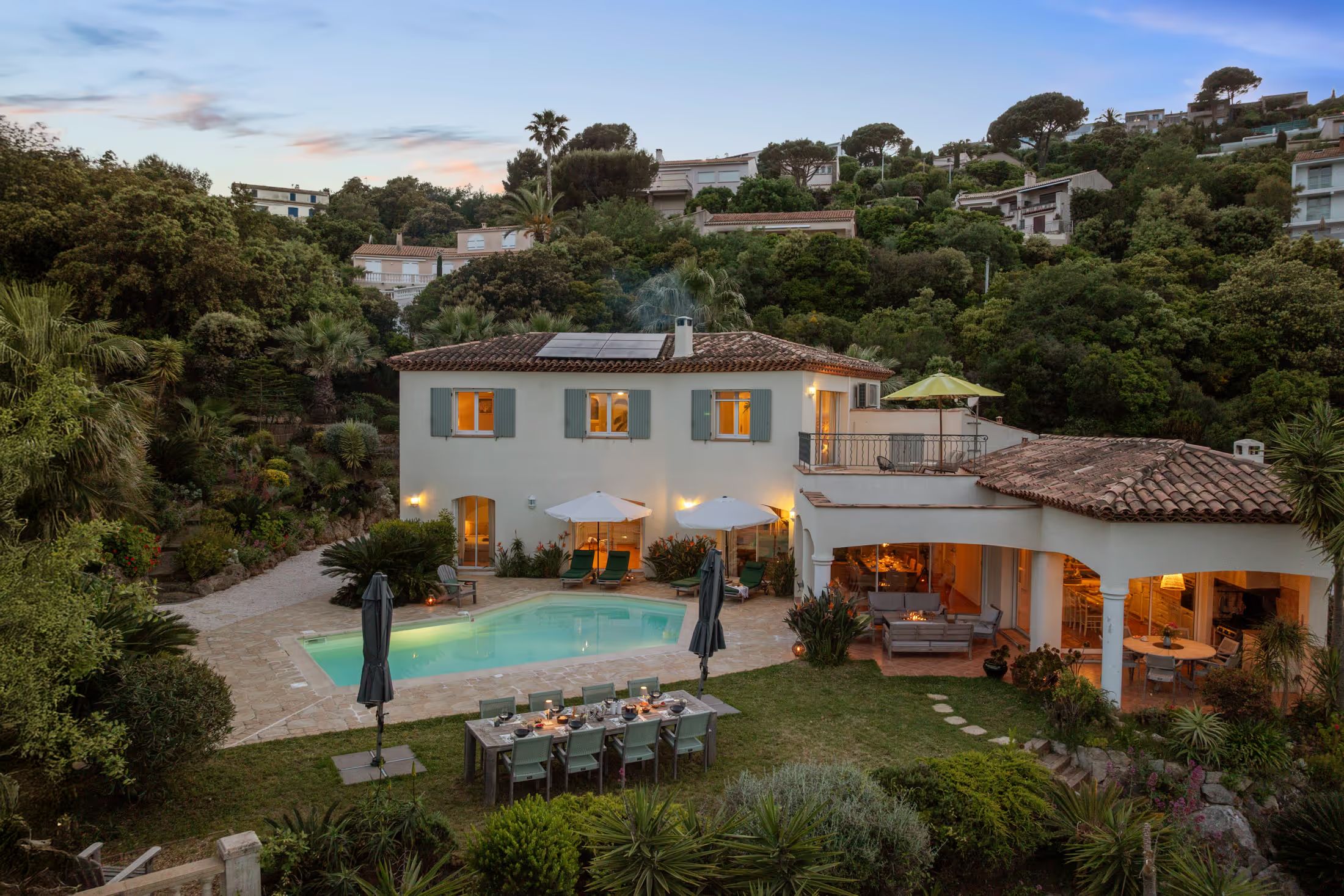 Aerial view of the villa at dusk
