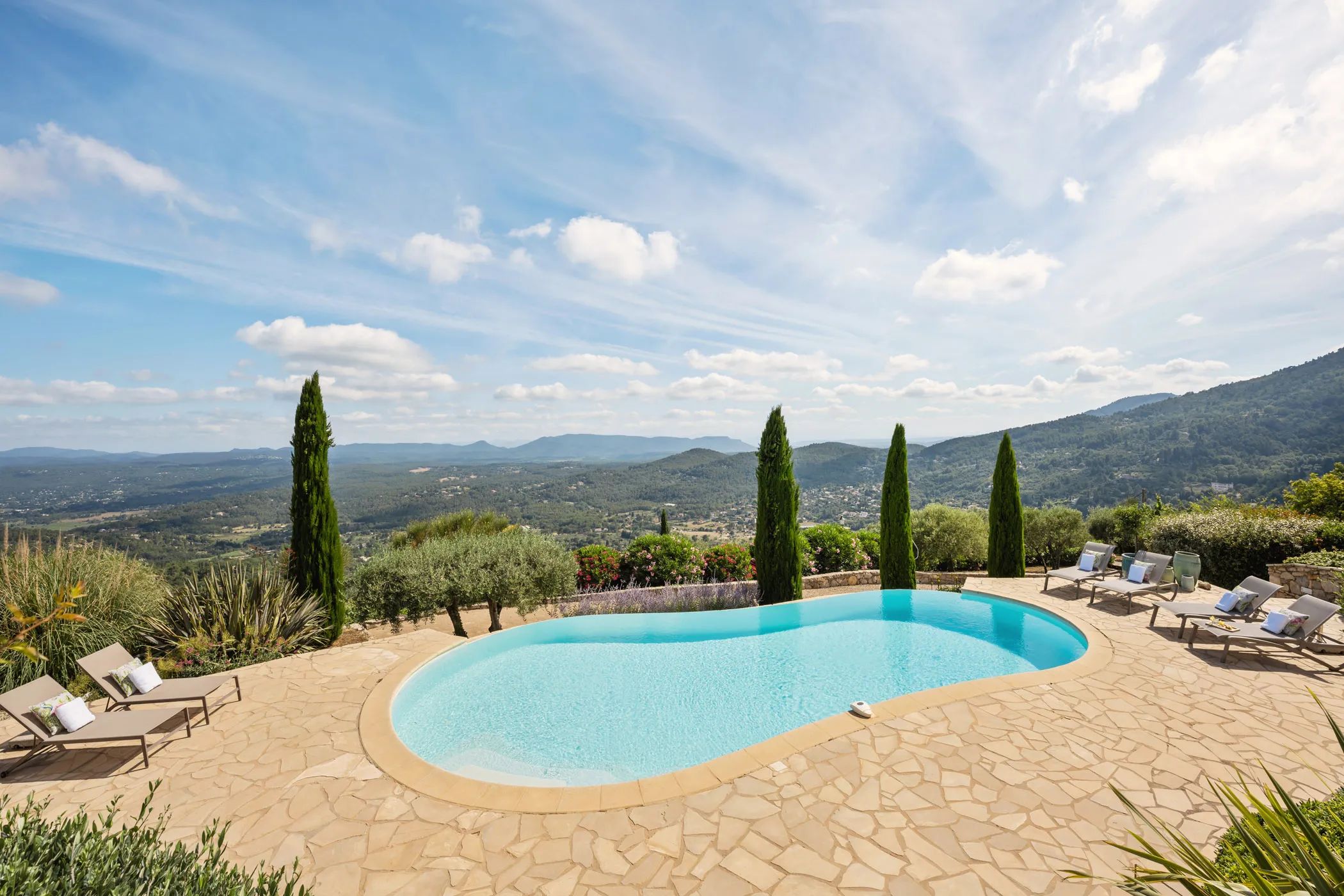 Pool with cypresses and a wide panoramic view