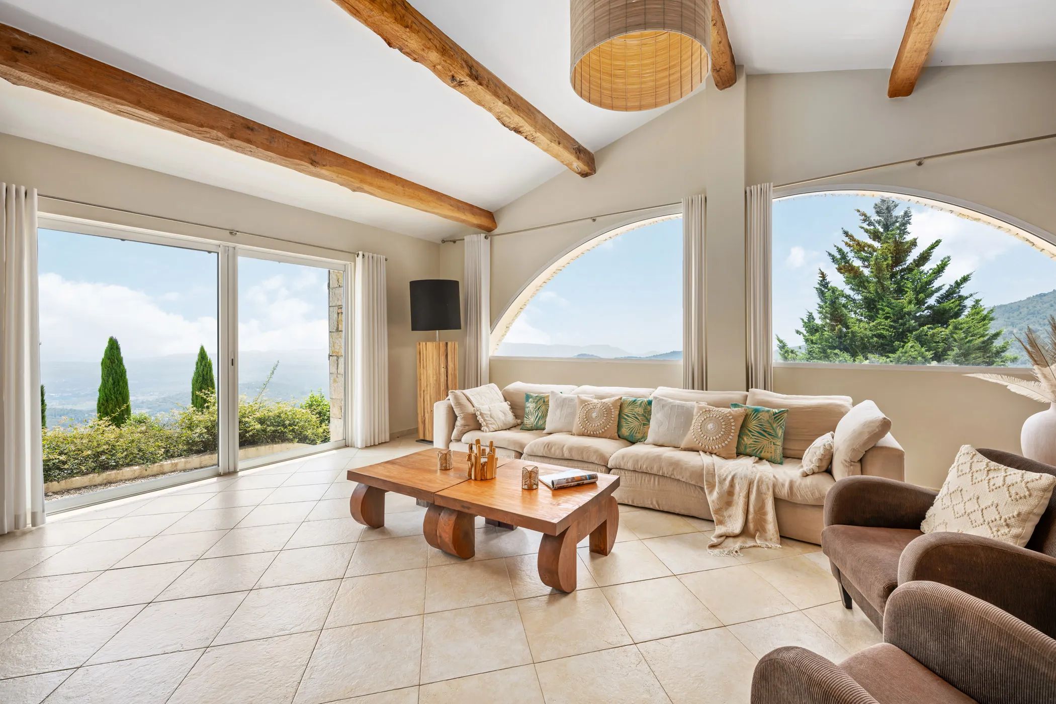 Living room with arched windows and panoramic view