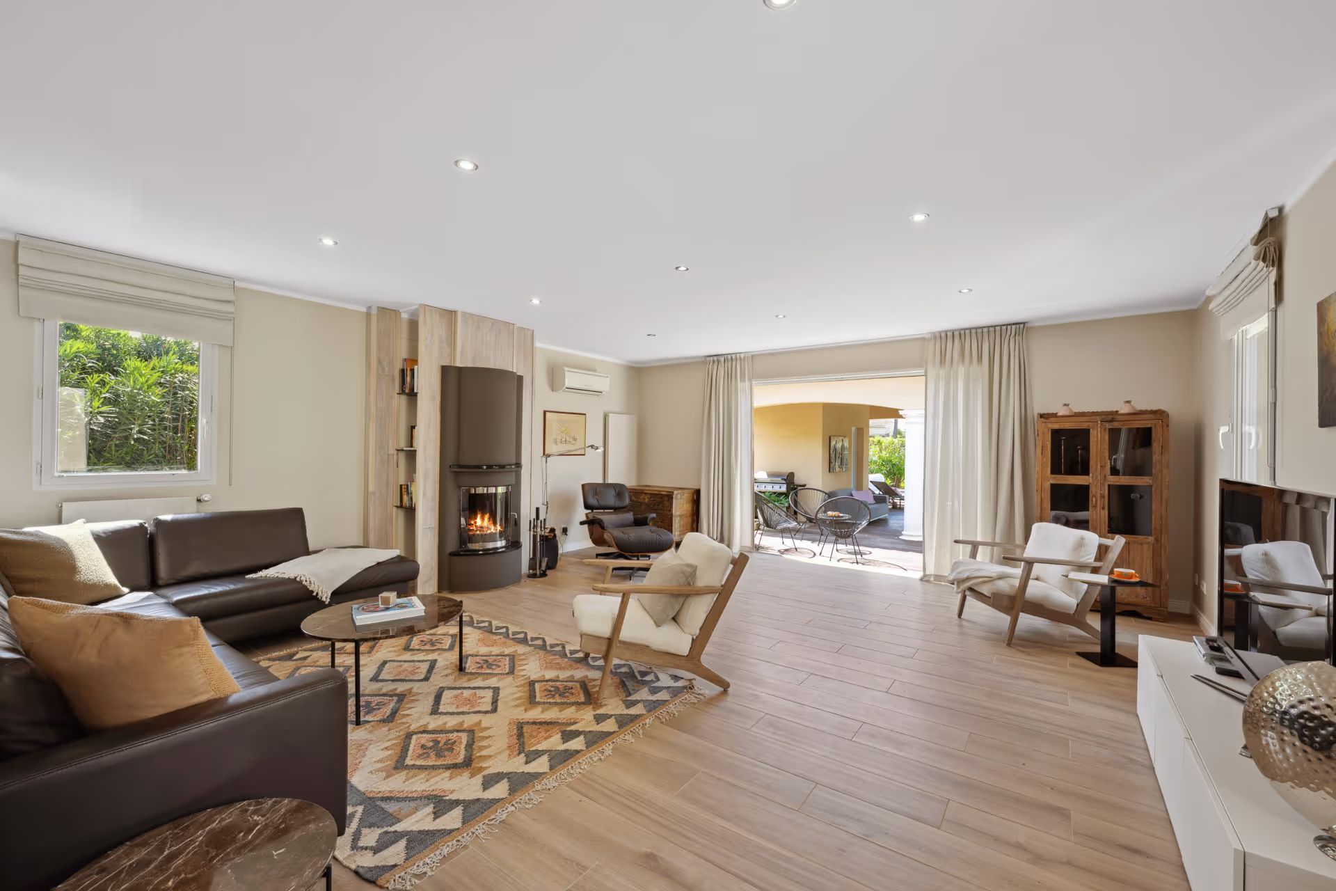 Living room with a fireplace and seating area